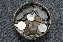 A box containing a quantity of pre-decimal British coinage and crowns