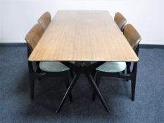 A mid 20th century teak G Plan six piece dining room suite