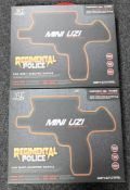 Two boxed Regimental Police mini uzi water pellet guns