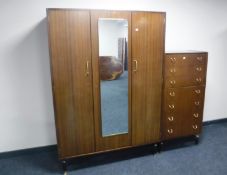 A mid 20th century teak G Plan wardrobe together with a seven drawer chest