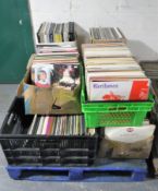 A pallet containing nine boxes and crates of vinyl LP's,