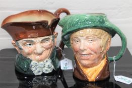 Two Royal Doulton character jugs : Old Charley, D 5420, height 15 cm, and 'Arriet, height 16 cm.