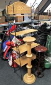 A folding metal and wicker whatnot together with a pine plant stand and a mahogany wig stand fitted