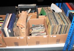 Four boxes containing 78's together with box containing 45's including ACDC etc