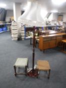 A mahogany standard lamp with shade together with two oak footstools