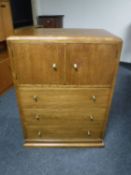 A mid 20th century oak linen chest