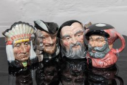 Four Royal Doulton character jugs : North American Indian, D 6614, height 11 cm, Robin Hood, D 6534,