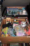 Two boxes containing vintage toys and games,