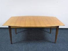 A mid 20th century teak dining table