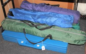 A tent in carry bag together with six folding chairs in carry bags and a folding picnic table