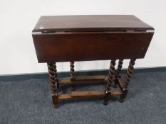 An oak barley twist gateleg table