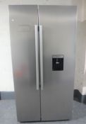 A Beko stainless steel American style two-door fridge freezer with water dispenser (less than 6