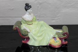 A Royal Doulton china figurine : At Ease, HN 2473, height 16 cm.
