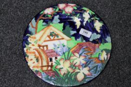 A Maling circular plaque : Blue Old Mill, diameter 28 cm.
