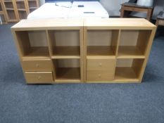 Two Ikea pine effect cube shelves