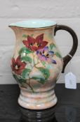 A Royal Doulton Magnella pattern hand-painted lustre jug, height 22 cm.