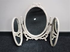 A white triple dressing table mirror