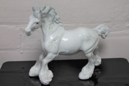 A Beswick china figurine : Cantering Shire, model 975, grey, gloss, height 22 cm.