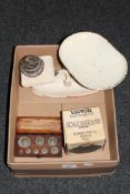 A box containing enamelled kitchen scales with weights, a set of boxed Victor scale weights,
