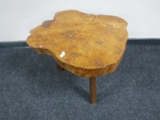A tree trunk cross-section coffee table CONDITION REPORT: The top measures 56cm by