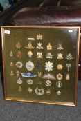 A gilt framed military montage