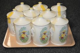 Nine Sylvac lidded china tea caddies, all the same,