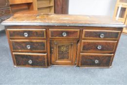 A Victorian sideboard with glass handles
