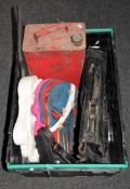 A crate containing vintage leather satchel, vintage oil can,