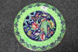 A Maling circular plaque : Birds and Flowers, numbered 5986, diameter 28 cm.