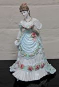 A Royal Worcester china figurine : Splendour at Court, height 23 cm.