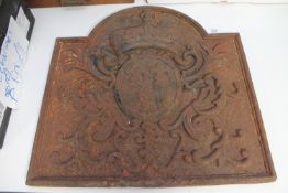 A late 19th century cast iron fire back