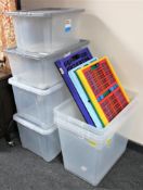 Ten plastic crates, four with lids