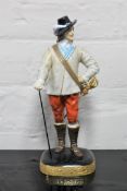 A Royal Worcester china figurine : Charles I After Van Dyck, numbered 2651, height 26 cm.
