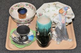 A tray containing a Spanish figure, clown with violin, antique floral pottery vase,