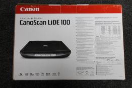 A boxed Canon Canoscan Lide 100 colour image scanner