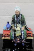 A Reginald Johnson Studio Pottery figure : Omar Khyyam, height 22cm.
