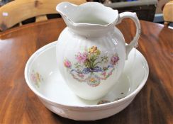 A floral pottery wash jug and basin
