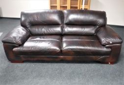 A brown leather settee