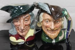 Two Royal Doulton character jugs : Robin Hood, D 6527, height 18 cm, and Pied Piper, D 6403,