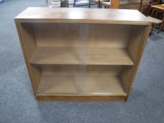 Two mid 20th century teak sliding door bookcases