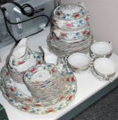Approximately fifty pieces of Booths Flora Dora tea and dinner ware