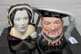 Two Royal Doulton character jugs : Henry VIII, D 6642, height 17 cm, and Catherine Howard, D 6645,