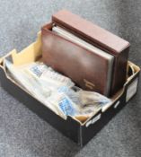 A box containing cigarette and cigar cards