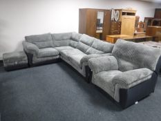 A three piece two-tone lounge suite comprising of corner settee,