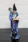 A Royal Doulton china figurine : The Wizard, HN 2877, height 25 cm.
