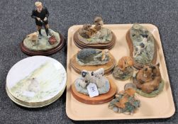 A tray containing eight Border Fine Arts figures together with a set of four Royal Doulton Country