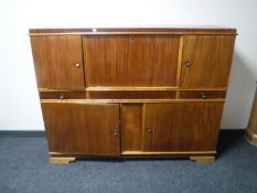 A mid 20th century teak sideboard