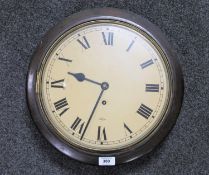 A circular oak cased Elliott wall timepiece