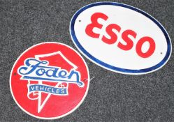 Two cast iron advertising signs,