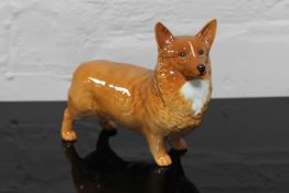 A Beswick china figurine : Corgi, model 1299B, gloss, height 14 cm.
